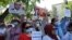 Supporters of Orhan Inandi demonstrate near the Turkish Embassy in Kyrgyzstan on June 2.