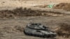 An Israeli Army main battle tank is deployed at a position along the border with Lebanon in northern Israel on October 1.