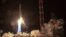 This handout picture provided by Russia's Roscosmos space agency and taken early on December 27 shows a Zenit rocket carrying Angosat-1, the first national telecoms satellite for Angola, lifting off from the launch pad in Kazakhstan.