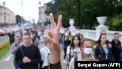 Suporteri ai opoziției din Belarus după o decizie a autorității electorale. Minsk, 14 iulie 2020