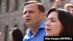 ACUM bloc leaders Andrei Nastase (left) and Maia Sandu accuse the ruling party of poisoning them.