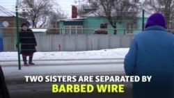 'We Feel Like Little Insects': Families Separated By Barbed Wire On Ukraine-Russia Border