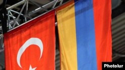 Armenia -- Turkish and Armenian flags fly alongside each other during an international sporting event in Yerevan, undated.