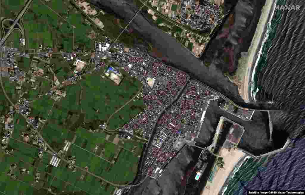 Satellite images show the destruction left by the tsunami in Hiroura Bay, outside Sendai, Japan. A 9.0 magnitude, six-minute-long earthquake in Japan triggered a massive tsunami on March 11, 2011. The tsunami brought waves as high as 40 meters in some areas, leaving ships on land, destroying villages, and flooding farmland. The images were taken on August 23, 2010 and March 11, 2011.