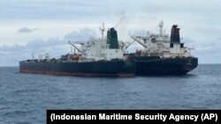 The seized tankers are seen anchored together in waters off the island of Borneo.