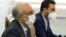 The head of Iran's Atomic Energy Organization Ali Akbar Salehi (left) speaks during a meeting with IAEA Director-General Rafael Grossi in Tehran on February 21.