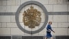 A woman walks outside the British Embassy building in Moscow. (file photo)