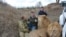 Олег Зубков і леви Чук та Гек у кримській «савані» парку левів «Тайган», архівне фото