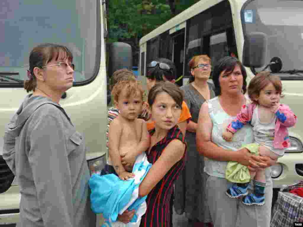 Refugees from South Ossetia flee to the Russian republic of North Ossetia. Most of South Ossetia's residents have Russian citizenship. Russian Foreign Minister Sergei Lavrov has accused Georgia of "ethnic cleansing" in the pro-Moscow region.
