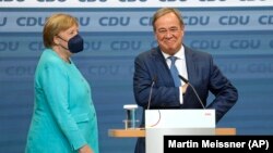 Angela Merkel și-ar dori să îi predea ștafeta lui Armin Laschet, însă rezultatul de duminică complică foarte mult aritmetica parlamentară din Germania.