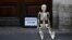 "Waited for pension": A model skeleton lies on the ground during a protest against the government's plan to raise the pension age in St. Petersburg on July 19.