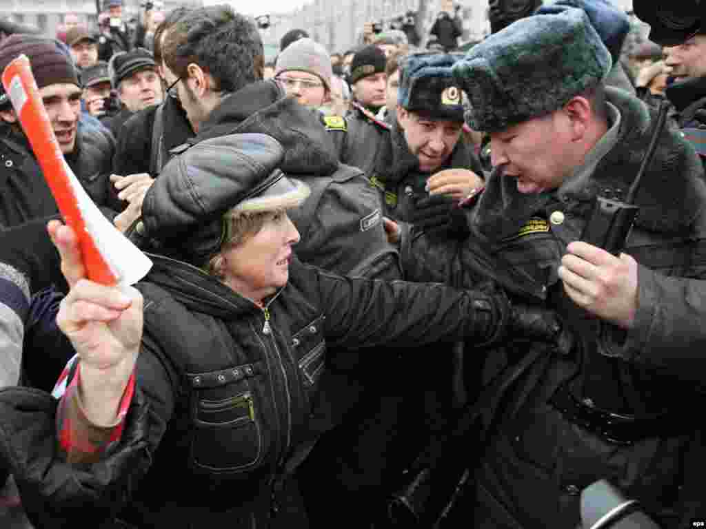 Police officers scuffled with protesters in Moscow.