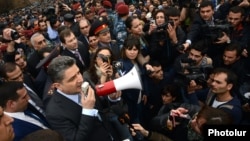 Armenia – Former Prime Minister Tigran Sarkisian addresses workers protesting against pension reform, Yerevan, 9Apr2014.