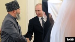 Prime Minister Vladimir Putin meets with religious leaders in the Danilov Monastery on February 8.