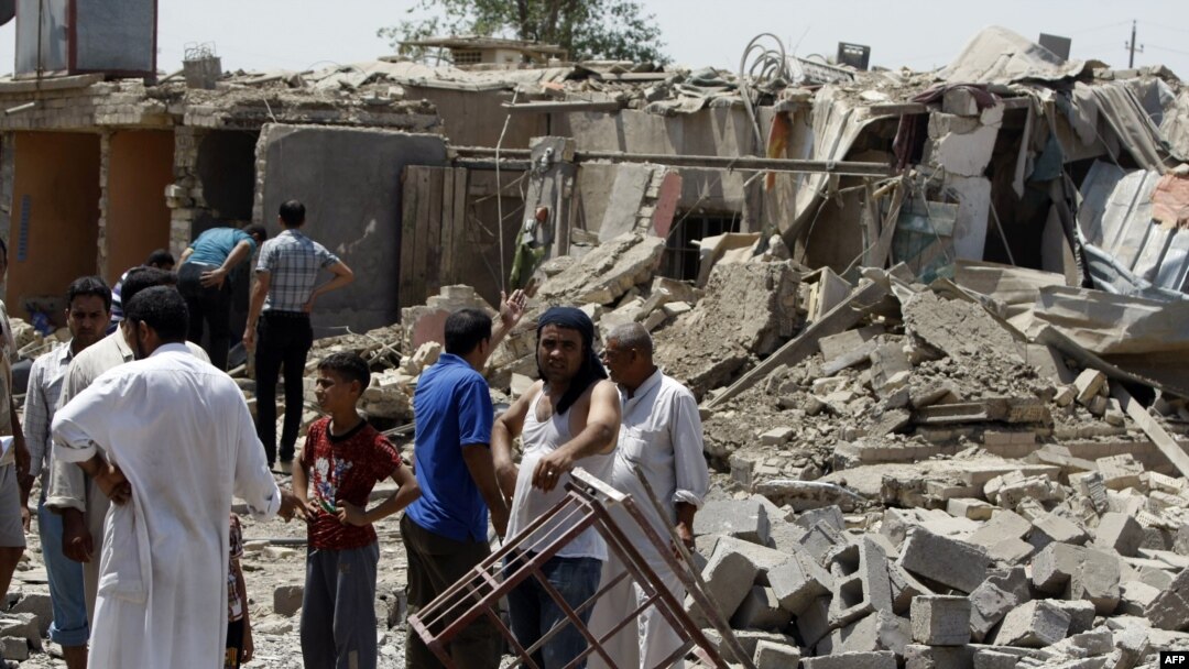 Aftermath of a July 23 bombing north of Baghdad that killed at least 42 people.