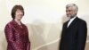 Iran's chief nuclear negotiator Said Jalili (right) and European Union foreign policy chief Catherine Ashton before talks in Almaty on April 5. 