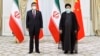 Chinese President Xi Jinping (left) and Iranian President Ebrahim Raisi in Samarkand, Uzbekistan, in September.