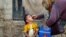 A boy receives polio-vaccine drops during an immunization campaign in Karachi.