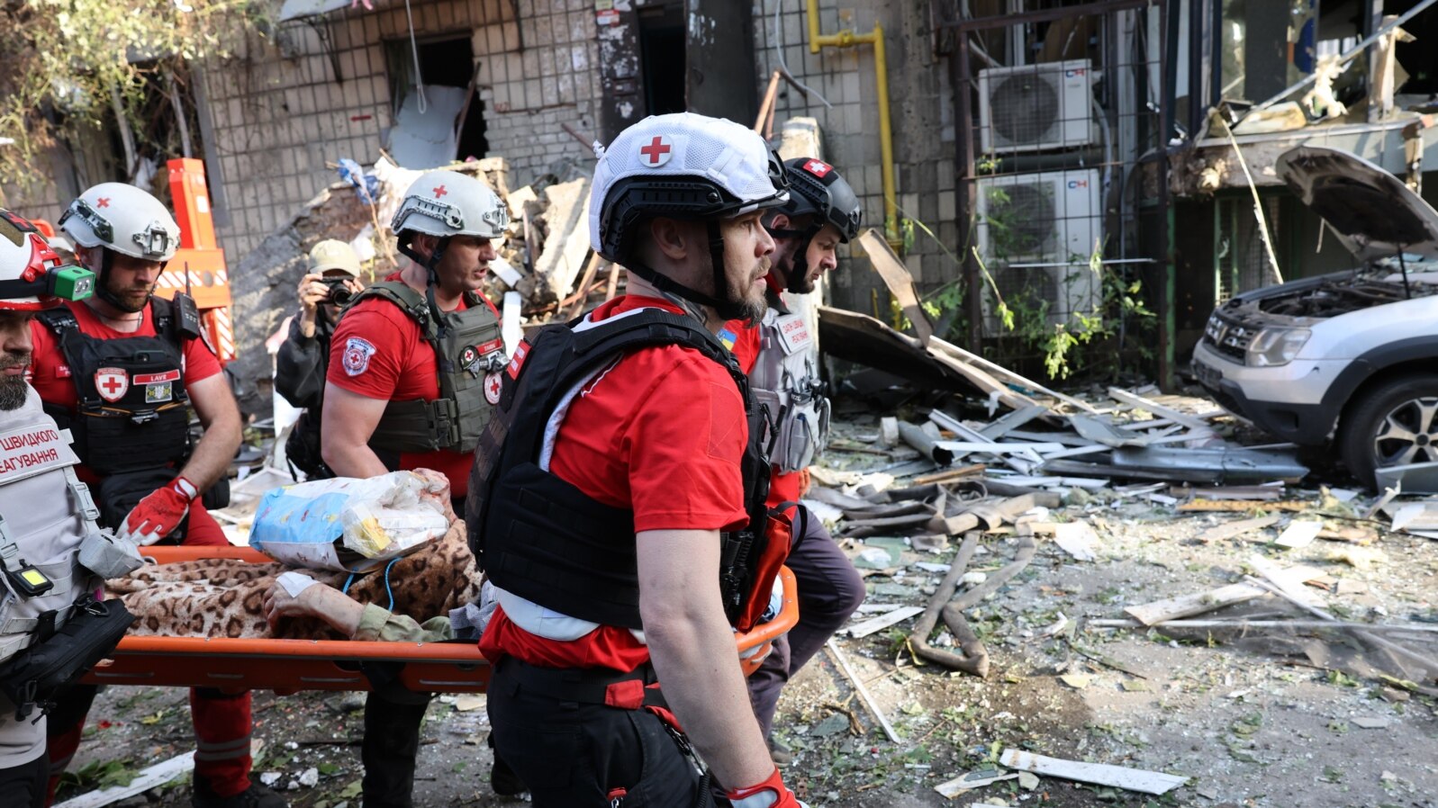 UKRAINE -- Rescuing a wounded person as a result of a Russian attack on Kyiv. June 17, 2025
