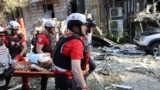 UKRAINE -- Rescuing a wounded person as a result of a Russian attack on Kyiv. June 17, 2025