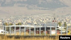 Turkey -- An Armenian cargo plane bound for Syria sits on the tarmac after landing at Erzurum airport to be searched by Turkish security services, 15Oct2012