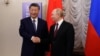 Russian President Vladimir Putin shakes hands with Chinese President Xi Jinping during a meeting on the sidelines of the BRICS Summit in Kazan, Russia October 22, 2024. 