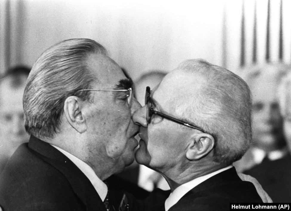 Brezhnev-Honecker kiss from a different angle - lips barely touching, breathing eachother's air