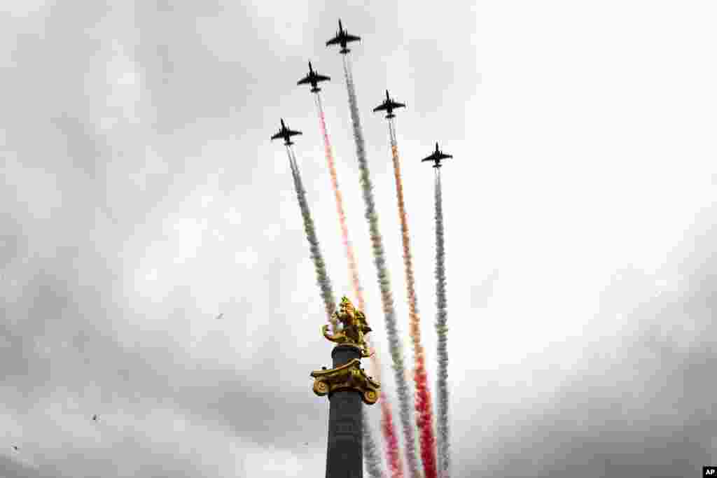 Military jets fly over Tbilisi during Independence Day celebrations in the Georgian capital on May 26.&nbsp;