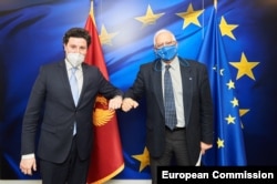 Then Montenegro's deputy prime minister, Dritan Abazovic (left) meets with EU foreign policy chiefJosep Borrell in Brussels in March 17, 2021.