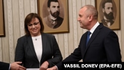 The leader of the Bulgarian Socialist Party, Cornelia Ninova (left), returns the mandate to form a government to President Rumen Radev (right) during their meeting in Sofia on September 7.