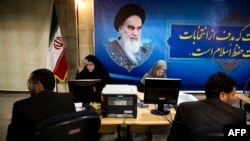 Men register their candidacy for the upcoming Iranian presidential election at the Interior Ministry in Tehran on May 7. 