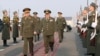 Armenia - General Valery Gerasimov (L), chief of staff of Russia's armed forces, and his Armenian counterpart, General Yuri Khachaturov, inspect an honor guard before their talks in Yerevan, 15Feb2013.