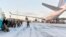 A Boeing 747 with some 300 U.S. Marines who were attending a six-month training session to learn about winter warfare lands in Stjordal, Norway, on January 16, 2017.