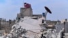 A photo released by the Syrian official news agency SANA shows the rubble of a house that according to the Syrian authorities was attacked by an Israeli airstrike, in the Damascus suburbs of Hajira, April 27, 2020