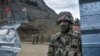 Azerbaijani soldiers on patrol at a checkpoint in the disputed Nagorno-Karabakh region. (file photo)