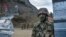 Azerbaijani soldiers on patrol at a checkpoint in the disputed Nagorno-Karabakh region. (file photo)