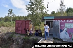 Utrobin with his farm workers. The 33-year-old has become a poster child for Putin's homesteader project.