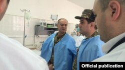 Nagorno-Karabakh - Armenian Defense Minister Seyran Ohanian visits a military hospital in Stepanakert, 21Mar2015.