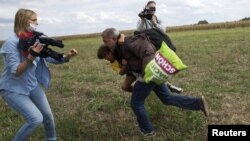 Инцидент с участием телеоператора Петры Ласло, осень 2015 года.