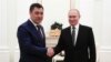 Kyrgyz President Meets With Putin In First Trip Abroad