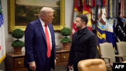 This file image shows Ukrainian President Volodymyr Zelensky (right) and US President Donald Trump (left) during their meeting at the White House in Washington on August 18.
