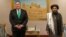 U.S. Secretary of State Mike Pompeo and Mullah Abdul Ghani Baradar, a co-founder of the Taliban and a former deputy to Mullah Omar. Baradar, who spent years in a Pakistani prison, is the Taliban’s political chief and was the head negotiator in talks with the United States.