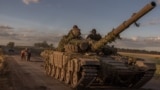 Ukrainian servicemen operate a Soviet-made T-72 tank in the Sumy region, near the border with Russia, on August 12, 2024, amid the Russian invasion of Ukraine.