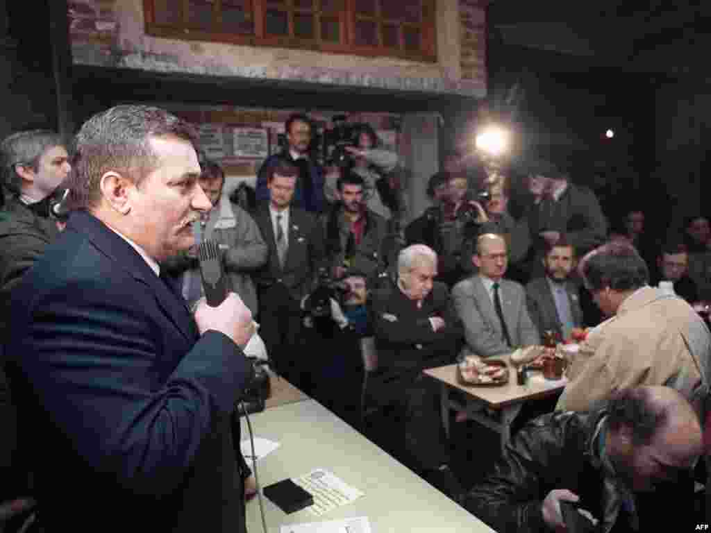 Walesa updates supporters on the Round Table Talks on March 12, 1989. Three months later, Solidarity would sweep elections for Poland's newly created bicameral parliament. 