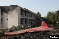 Pjesë e avionit që u rrëzua në Indi.