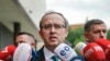 KOSOVO -- Kosovo's new Prime Minister Avdullah Hoti, of the center-right Democratic League of Kosovo, talks to media outside the parliament building in Pristina, Wednesday, June 3, 2020