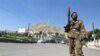 Tanks, Troops Guard Kabul After Riots