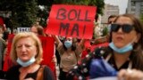 KOSOVO -- Dozens of women and civil society activists protest after murder of a teenage woman, in Pristina, Kosovo, 26 August 2021