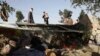 Internally displaced Afghans from northern provinces who fled fighting take refuge in a public park in Kabul on August 13.