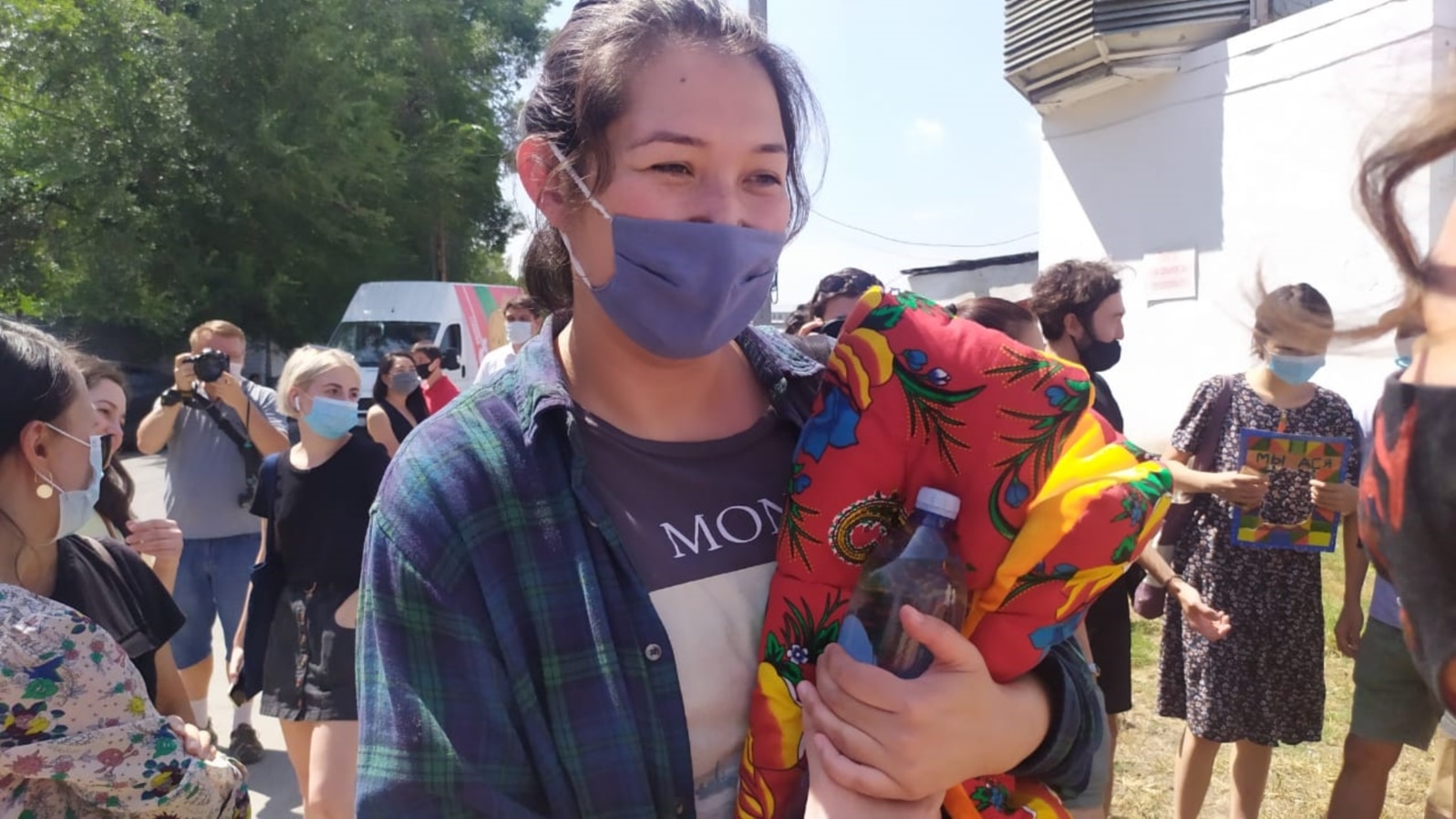 Kazakhstan - Supporters meet Asya Tulesova near the detention center. Almaty, 12 August 2020